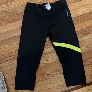Reebok black leggings with mesh bottom